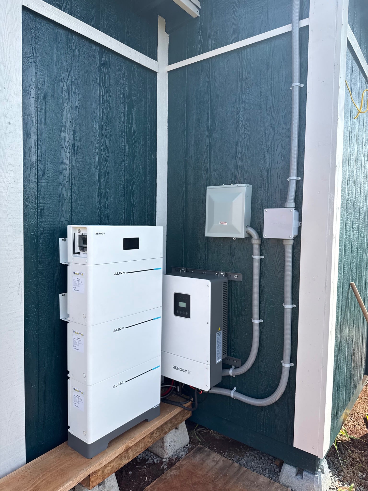 Wall-mounted lithium battery storage and inverter installation